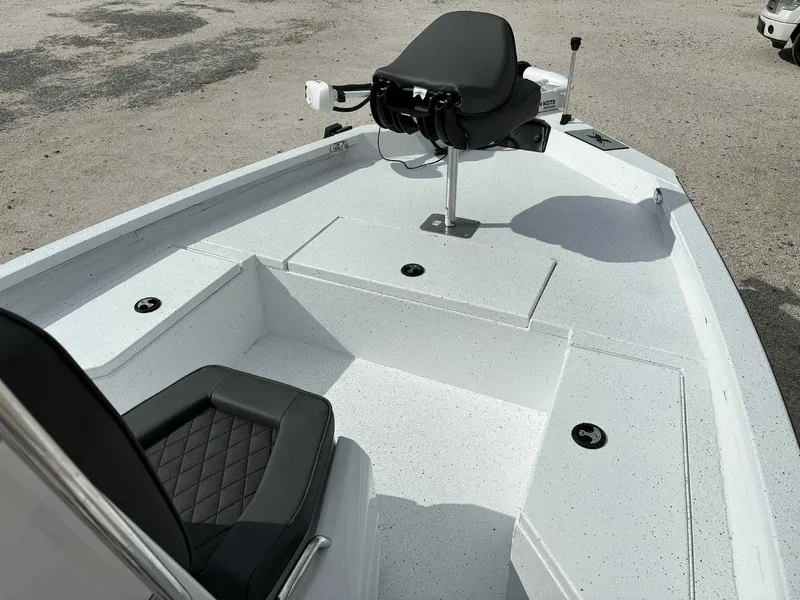 Slide: The Image of 2026 Xpress H20B Bay boat with seating and storage. - 10