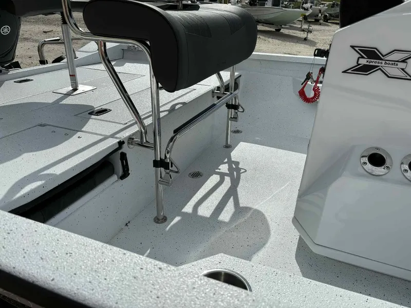 Slide: The Image of Interior of Xpress H20B Bay boat, model year 2026. - 11