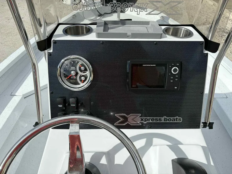 Slide: The Image of Dashboard of Xpress H20B Bay boat, model year 2026. - 13