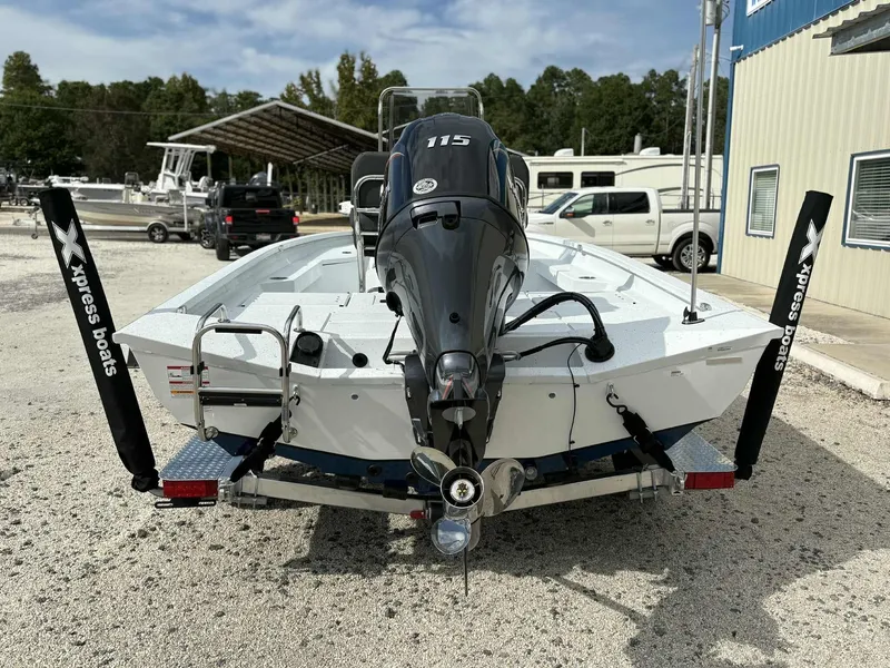 Slide: The Image of Rear view of 2026 Xpress H20B Bay boat with outboard motor. - 6