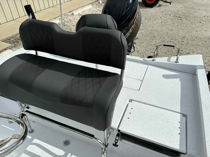 Slide: The Image of 2026 Xpress H20B Bay boat seat and motor view. - 8
