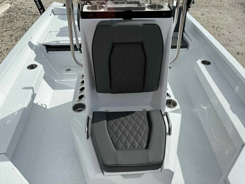 Slide: The Image of Seating area of Xpress H20B Bay boat, 2026 model. - 9