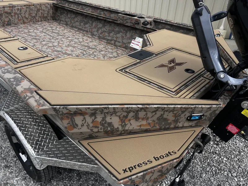 Slide: The Image of 2026 Xpress Hyper-Lift Duck Boat X18DB with camouflage design. - 7