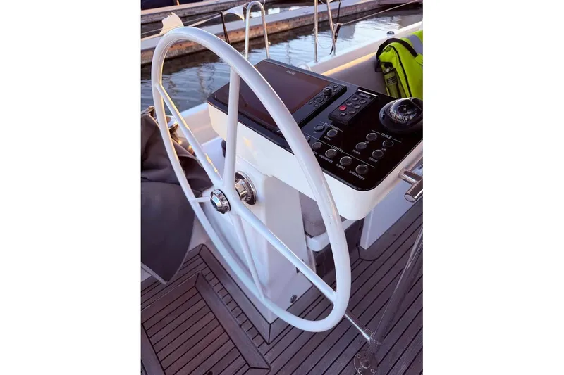Slide: The Image of Steering wheel and control panel of 2022 Beneteau Oceanis Yacht 54. - 20