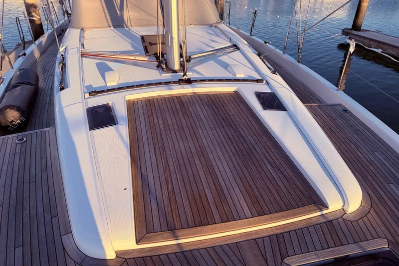 Slide: The Image of Deck of 2022 Beneteau Oceanis Yacht 54 with elegant wood finish. - 9