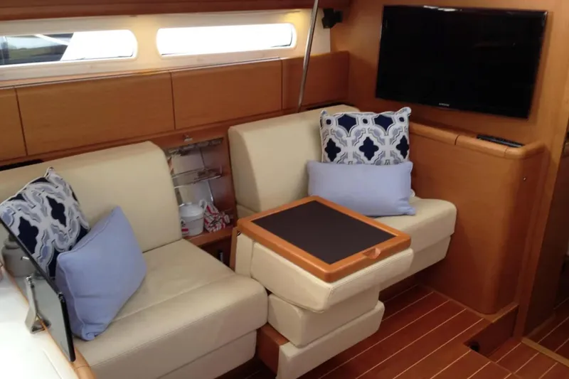 Slide: The Image of Luxurious interior of 2011 Jeanneau 57 yacht with cozy seating and modern decor. - 36