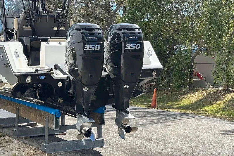 Slide: The Image of 2018 Tidewater 320 CC Adventure with twin Mercury Verado 350 engines on a trailer. - 5
