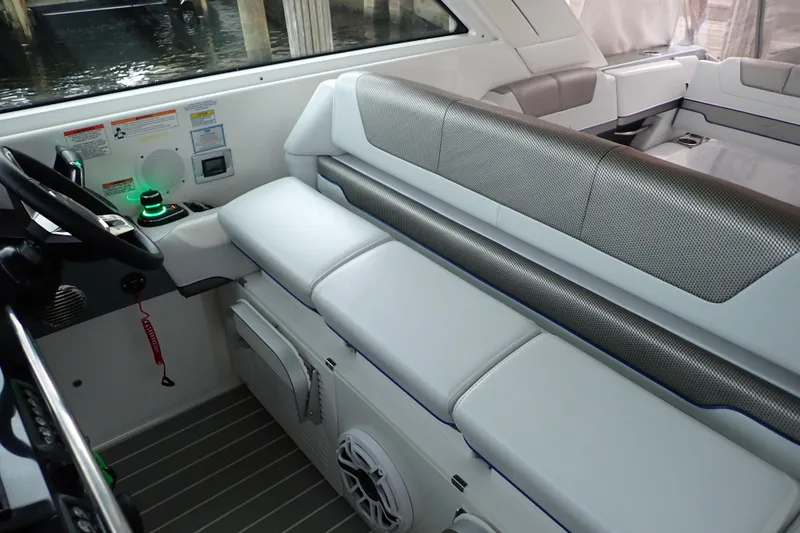 Slide: The Image of 2023 Formula 380 Super Sport Crossover OB interior with sleek seating and modern controls. - 11