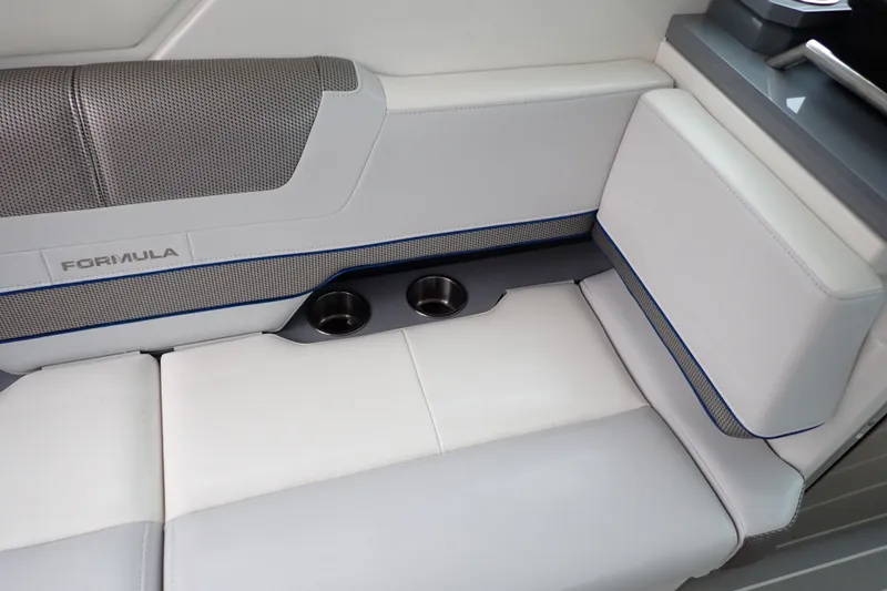 Slide: The Image of 2023 Formula 380 Super Sport Crossover OB interior seating with cup holders. - 15