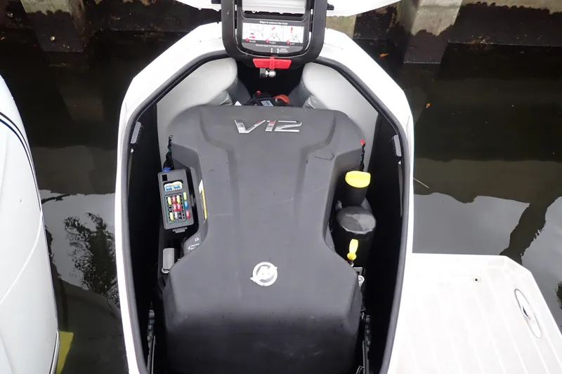 Slide: The Image of 2023 Formula 380 Super Sport Crossover OB engine compartment with V12 motor. - 19