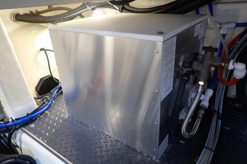 Slide: The Image of Engine compartment of 2023 Formula 380 Super Sport Crossover OB, showcasing mechanical components. - 42