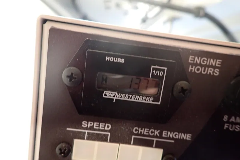 Slide: The Image of Engine hour meter displaying 137 hours on a 2023 Formula 380 Super Sport Crossover OB. - 43