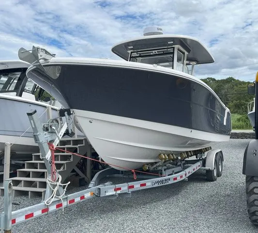 Slide: The Image of Robalo R302 Center Console 2024 - 1