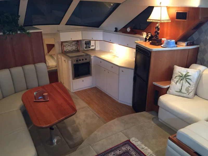 Slide: The Image of Interior of 1998 Silverton 372 Motor Yacht, cozy and elegantly furnished. - 21