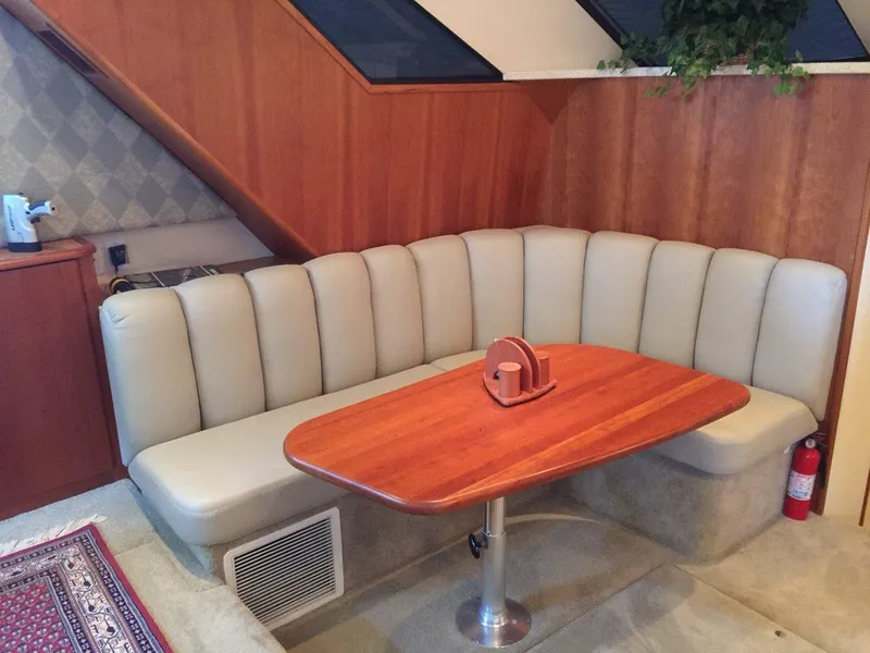 Slide: The Image of Interior of 1998 Silverton 372 Motor Yacht with leather seating. - 22
