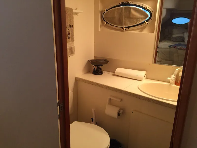 Slide: The Image of 1998 Silverton 372 Motor Yacht bathroom interior. - 30