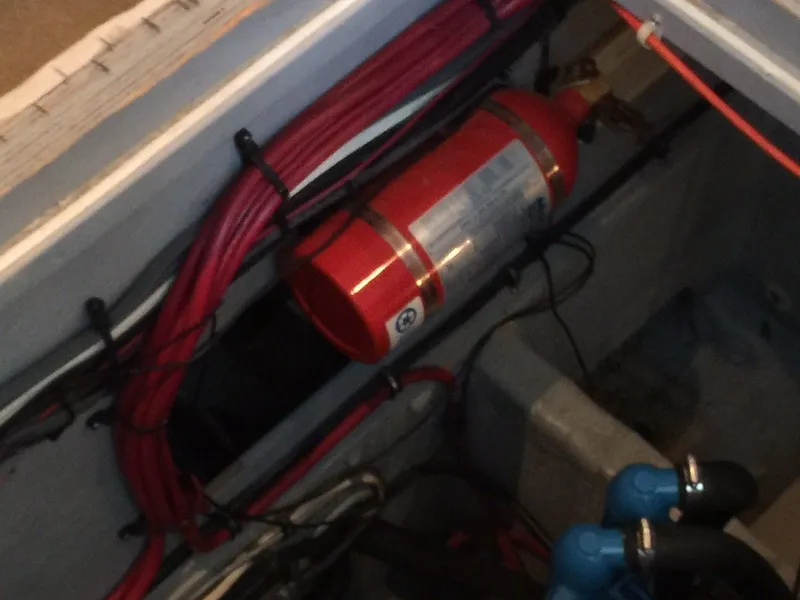 Slide: The Image of Interior of a 1998 Silverton 372 Motor Yacht with fire extinguisher. - 35