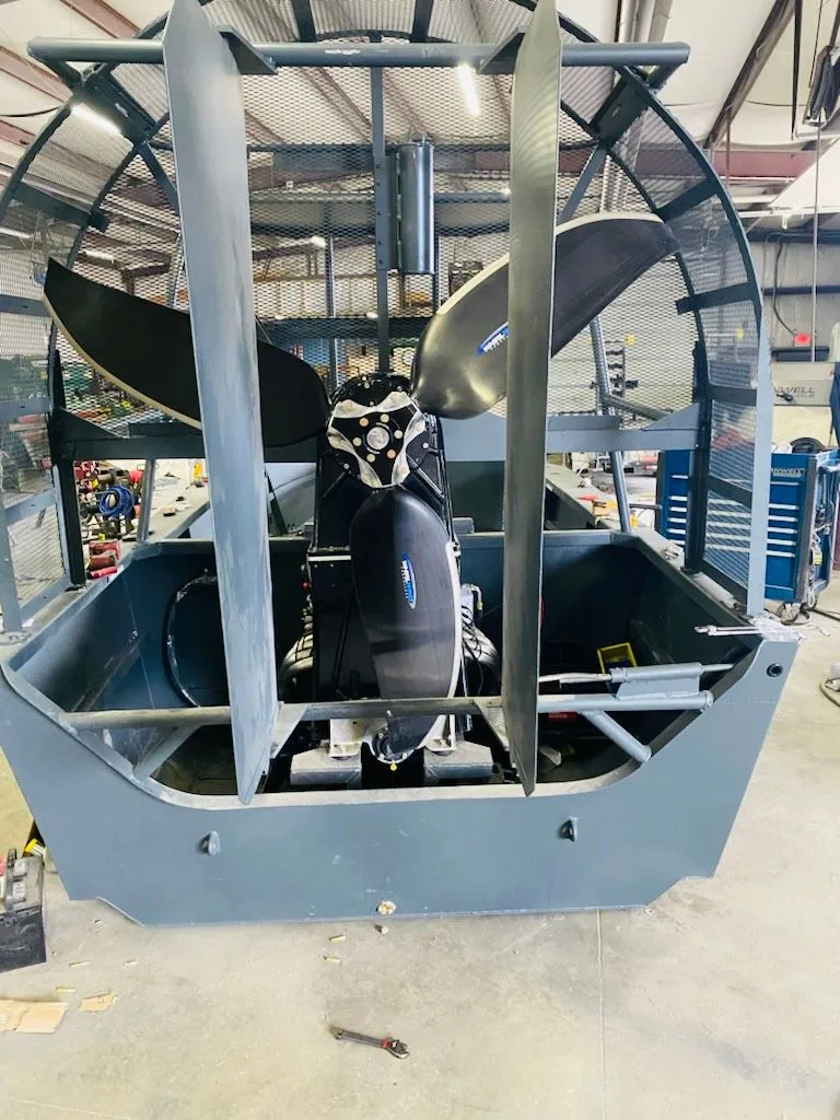 Slide: The Image of 2022 Duck Water Boats Airboat 23 in workshop setting. - 10