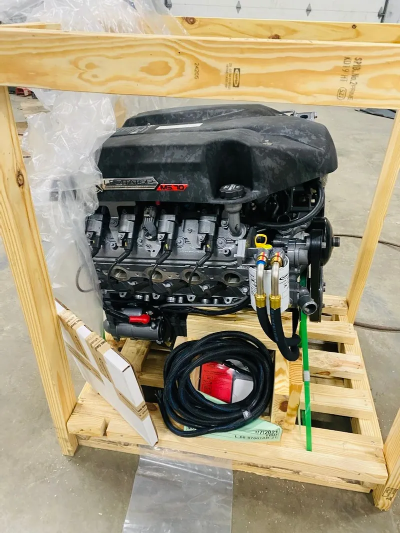 Slide: The Image of Engine of Duck Water Boats Airboat 23, 2022 model, on wooden pallet. - 11