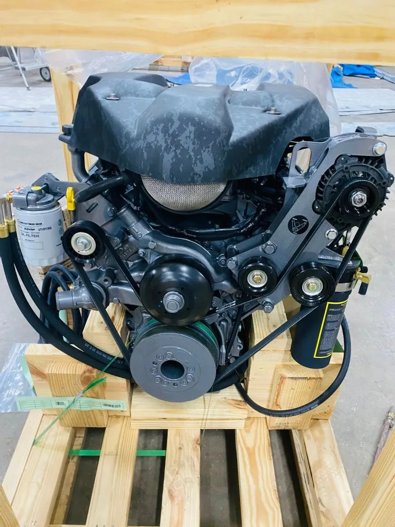 Slide: The Image of Engine of a 2022 Duck Water Boats Airboat 23 on wooden pallet. - 12