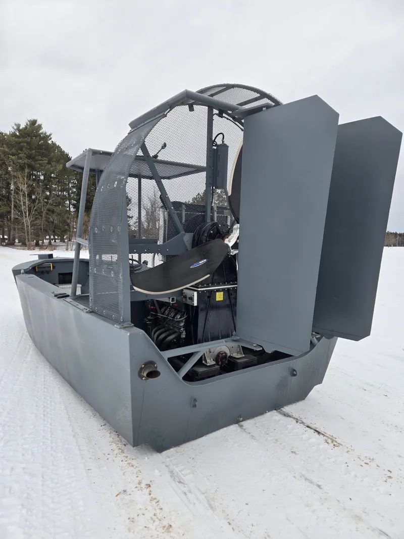 Slide: The Image of Duck Water Boats Airboat 23, 2022, on snow-covered ground. - 3