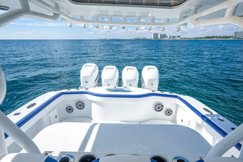 Slide: The Image of 2023 Yellowfin 39 Offshore boat with four engines on open sea. - 57