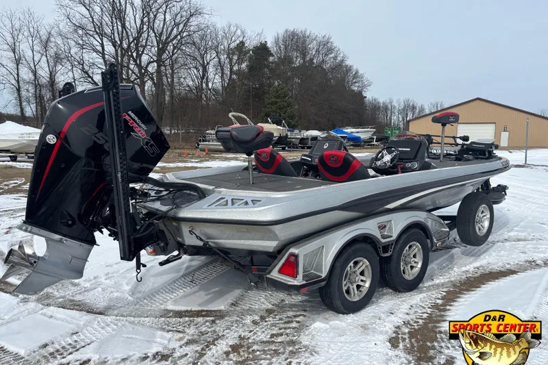 Slide: The Image of 2020 Ranger Z521L boat with Mercury engine on snowy ground. - 2