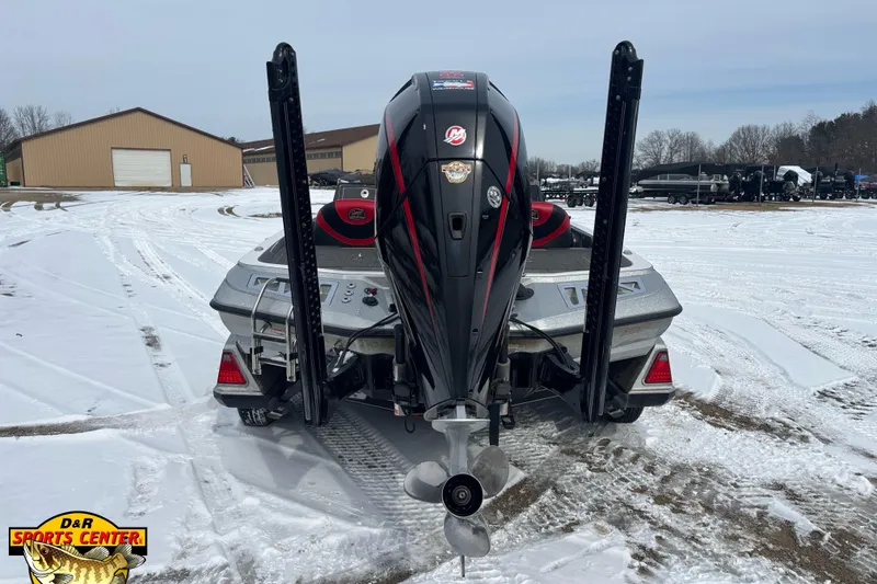 Slide: The Image of 2020 Ranger Z521L boat with powerful outboard motor on snowy ground. - 4