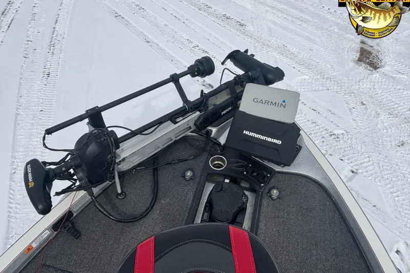 Slide: The Image of 2020 Ranger Z521L boat with Garmin and Humminbird electronics on snowy ground. - 6