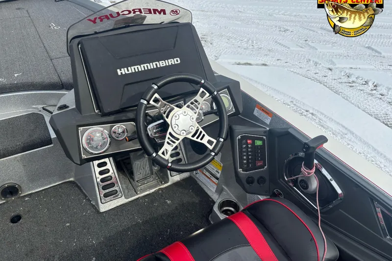 Slide: The Image of 2020 Ranger Z521L boat dashboard with Humminbird display and steering wheel. - 8