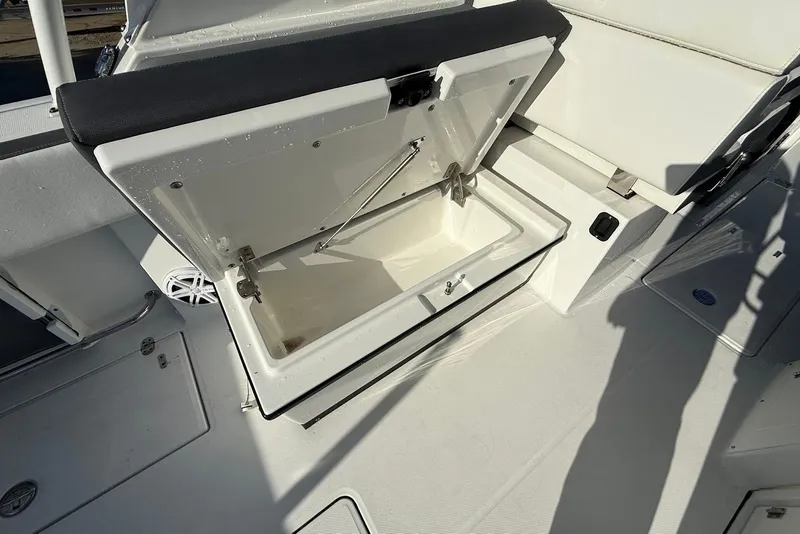 Slide: The Image of Open storage compartment on 2019 Blackfin 272 DC boat deck. - 25