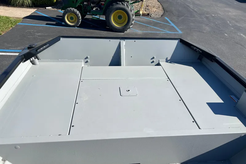 Slide: The Image of 2026 Crestliner 1870 Retriever FCC boat interior with spacious deck and storage compartments. - 12