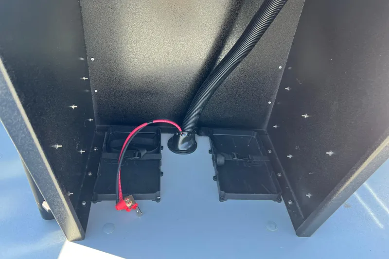 Slide: The Image of Interior view of 2026 Crestliner 1870 Retriever FCC boat compartment with wiring. - 14