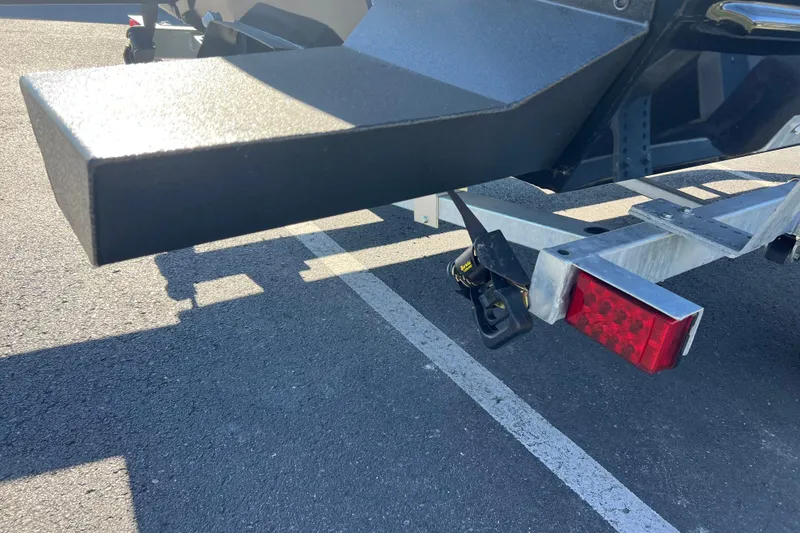 Slide: The Image of Rear view of 2026 Crestliner 1870 Retriever FCC boat trailer hitch and taillight. - 3