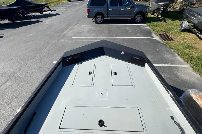 Slide: The Image of 2026 Crestliner 1870 Retriever FCC boat on trailer in parking lot. - 5