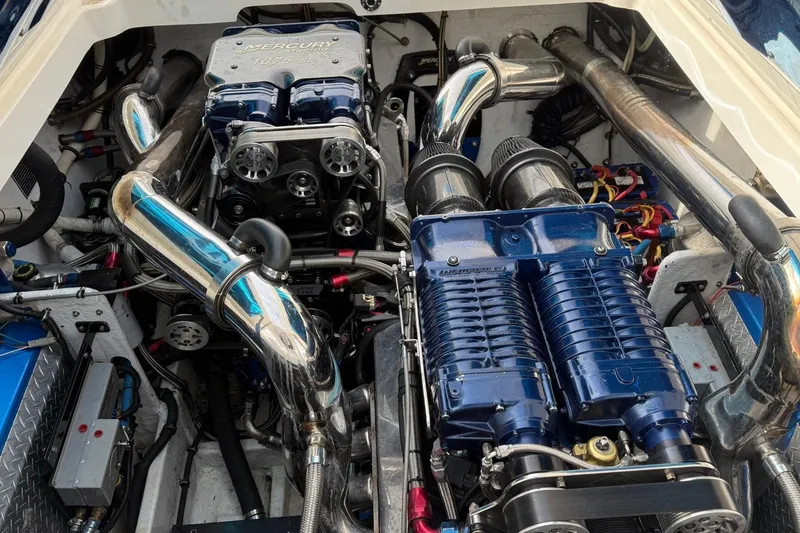 Slide: The Image of Engine compartment of a 2010 Fountain 42 Lightning boat with Mercury 1075 SCi engines. - 11