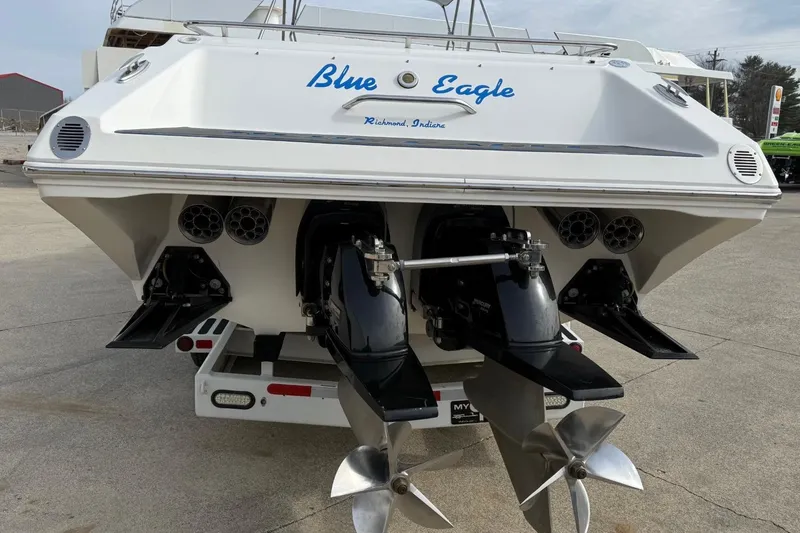 Slide: The Image of 2010 Fountain 42 Lightning boat, rear view with dual propellers and "Blue Eagle" name. - 4