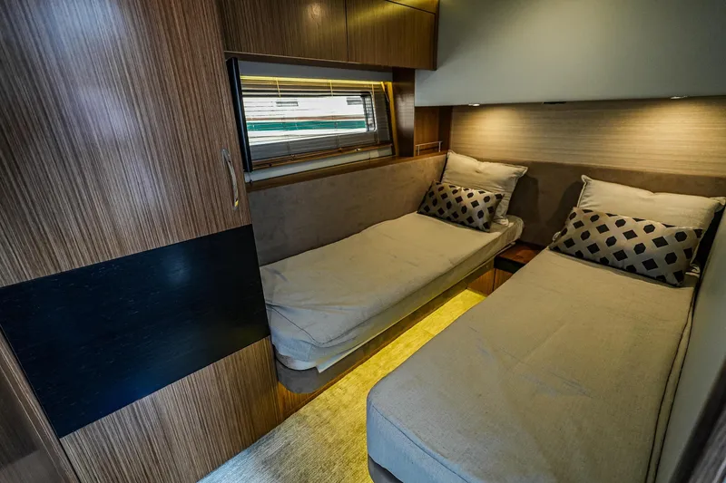 Slide: The Image of Luxurious twin cabin interior of 2018 Sea Ray L590 Fly yacht. - 28