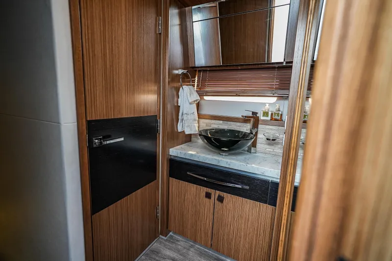 Slide: The Image of Luxurious bathroom interior of 2018 Sea Ray L590 Fly yacht with modern fixtures. - 39