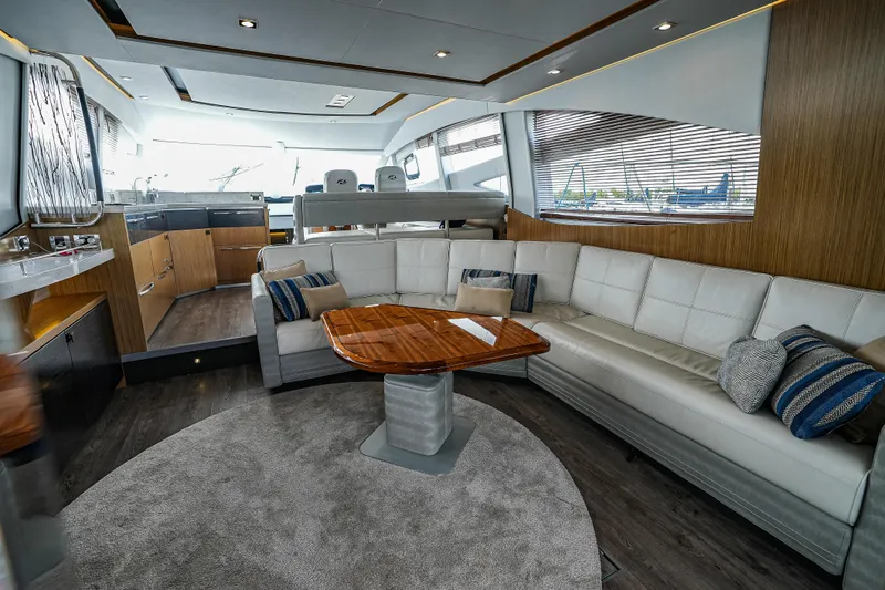 Slide: The Image of Luxurious interior of 2018 Sea Ray L590 Fly yacht with elegant seating and modern design. - 5