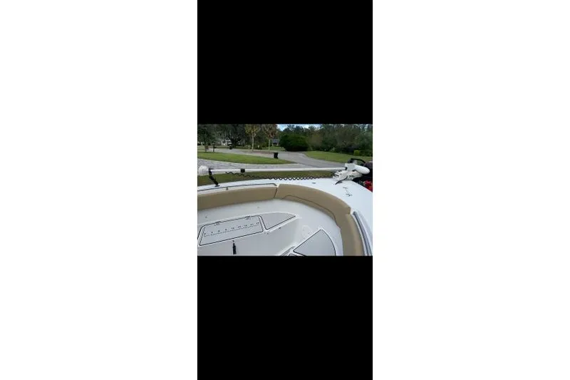 Slide: The Image of 2017 Sportsman Open 252 Center Console boat, view of bow seating and surroundings. - 7