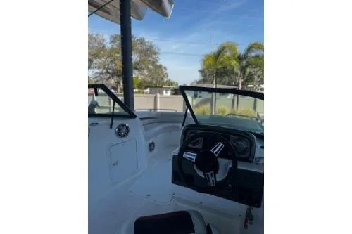 Slide: The Image of 2023 Hurricane SunDeck Sport 188 OB boat interior with steering wheel and dashboard. - 4