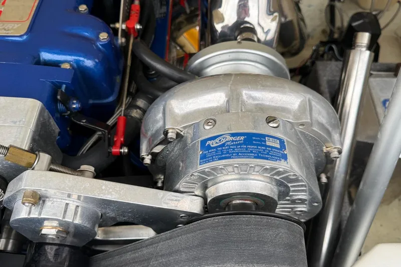 Slide: The Image of Close-up of a ProCharger engine component in a 2004 Eliminator 280 Eagle XP boat. - 12