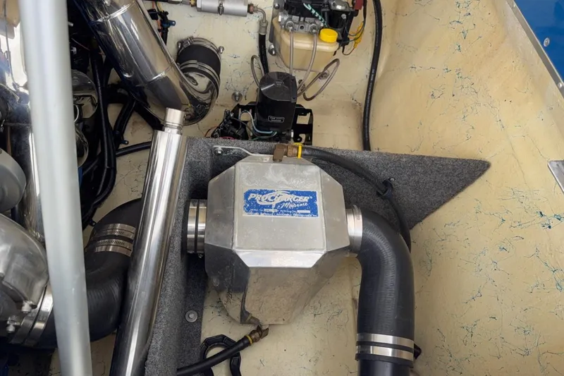 Slide: The Image of Engine compartment of a 2004 Eliminator 280 Eagle XP boat with ProCharger system. - 13