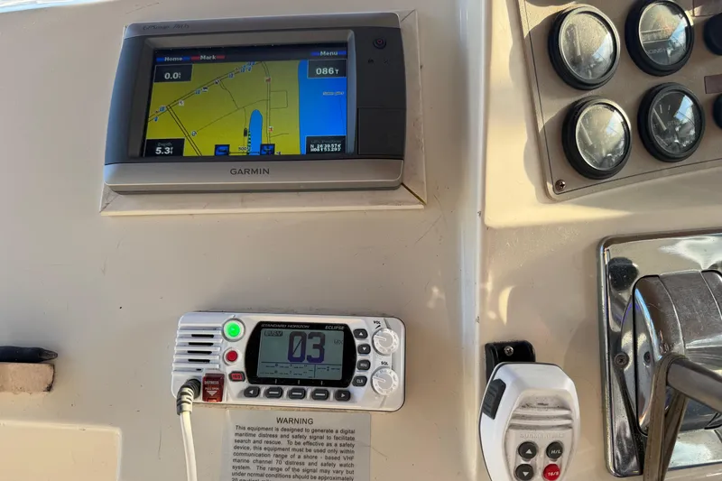 Slide: The Image of Control panel of 2000 Carver 356 Aft Cabin Motor Yacht with Garmin navigation system. - 14