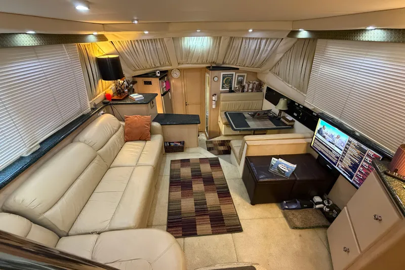 Slide: The Image of Luxurious interior of 2000 Carver 356 Aft Cabin Motor Yacht with plush seating and modern amenities. - 17
