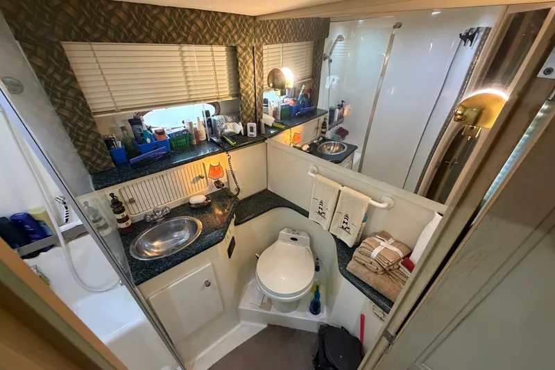 Slide: The Image of Luxurious bathroom in 2000 Carver 356 Aft Cabin Motor Yacht with modern amenities. - 36