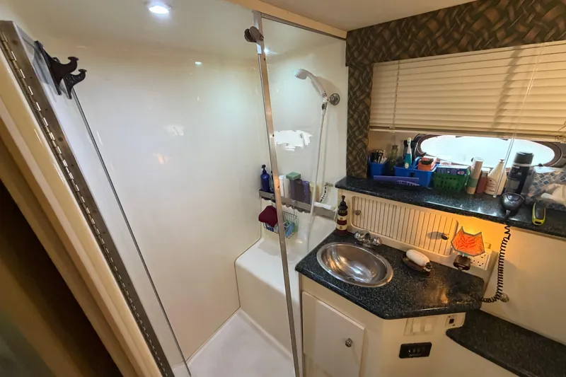 Slide: The Image of Bathroom interior of 2000 Carver 356 Aft Cabin Motor Yacht with shower and sink. - 37