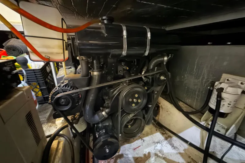 Slide: The Image of Engine room of 2000 Carver 356 Aft Cabin Motor Yacht, showcasing mechanical components. - 39