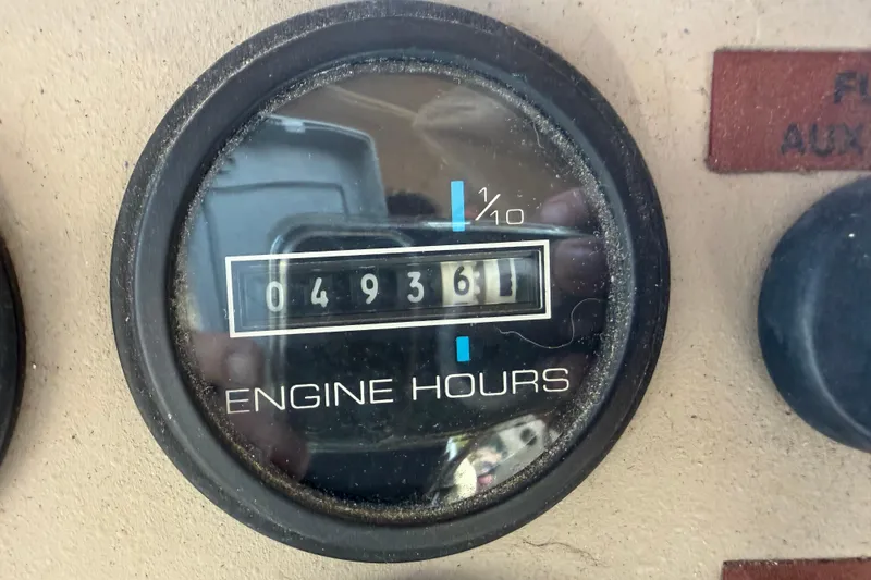 Slide: The Image of Close-up of engine hours gauge reading 4936.1 on 2000 Carver 356 Aft Cabin Motor Yacht. - 15